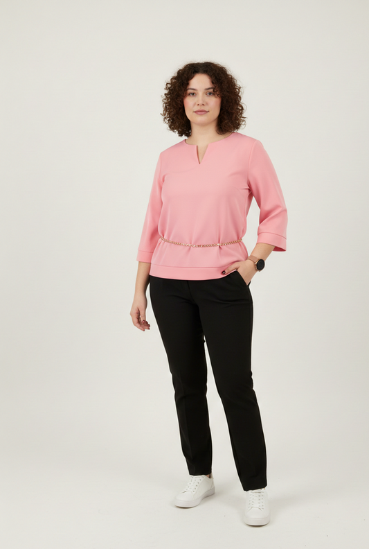 Ροζ φούτερ με μανίκια 3/4 και ζωνάκι χρυσό. 